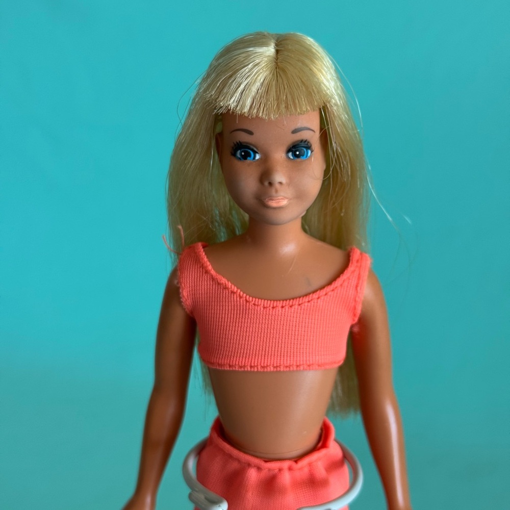 Malibu skipper in orange swimsuit